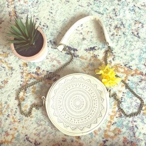 T-shirt and Jeans Brand cross body.